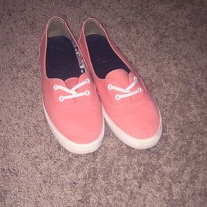 Peach Vans sliders.